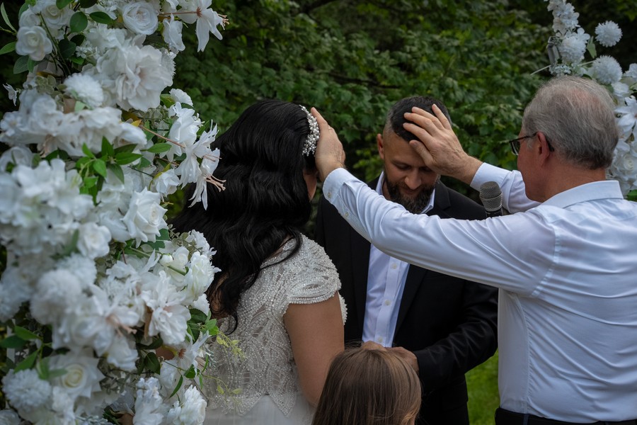 A quiet moment during the outdoor wedding ceremony